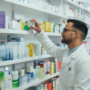 handsome-pharmacist-working-in-a-pharmacy.jpg